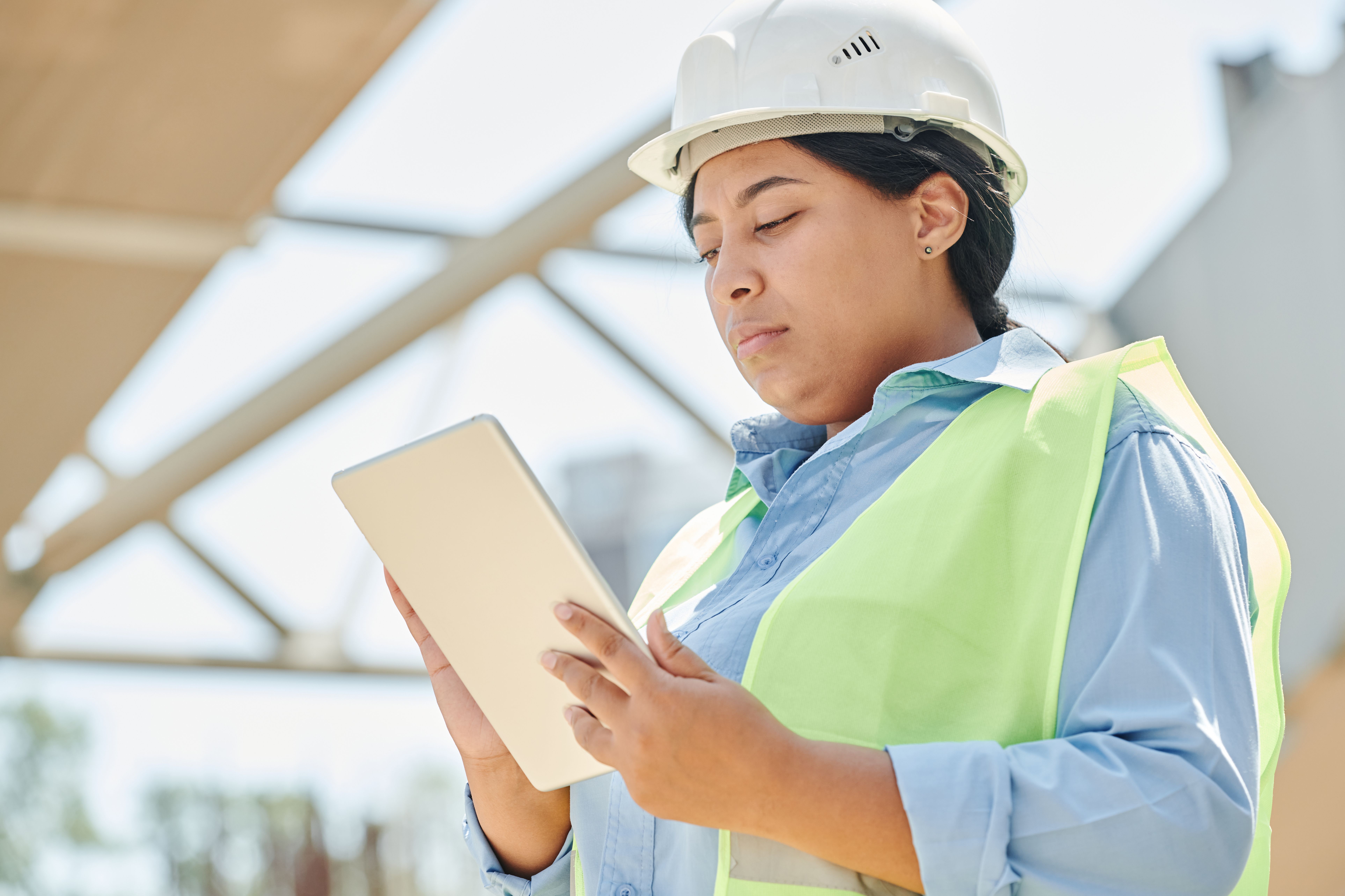 Engineer using a digital tablet on site